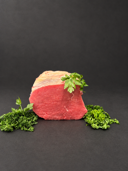Beef Joint on a smooth charcoal background