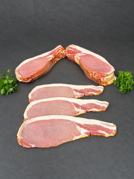 Smoked Back Bacon on a smooth charcoal background
