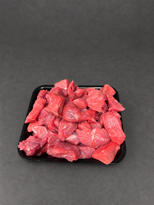 Diced Beef on a smooth charcoal background