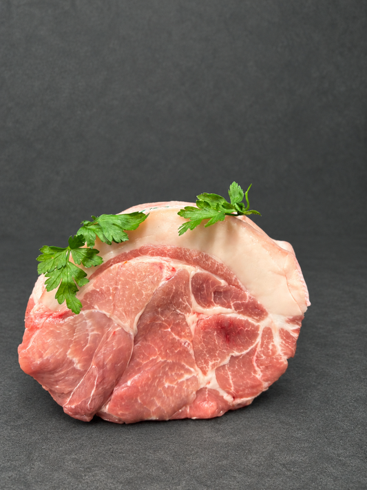 Shoulder Of Pork on a smooth charcoal background