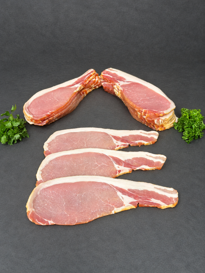 Smoked Back Bacon on a smooth charcoal background