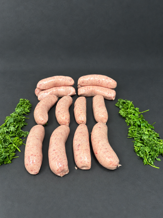 Thick Pork Sausage on a smooth charcoal background