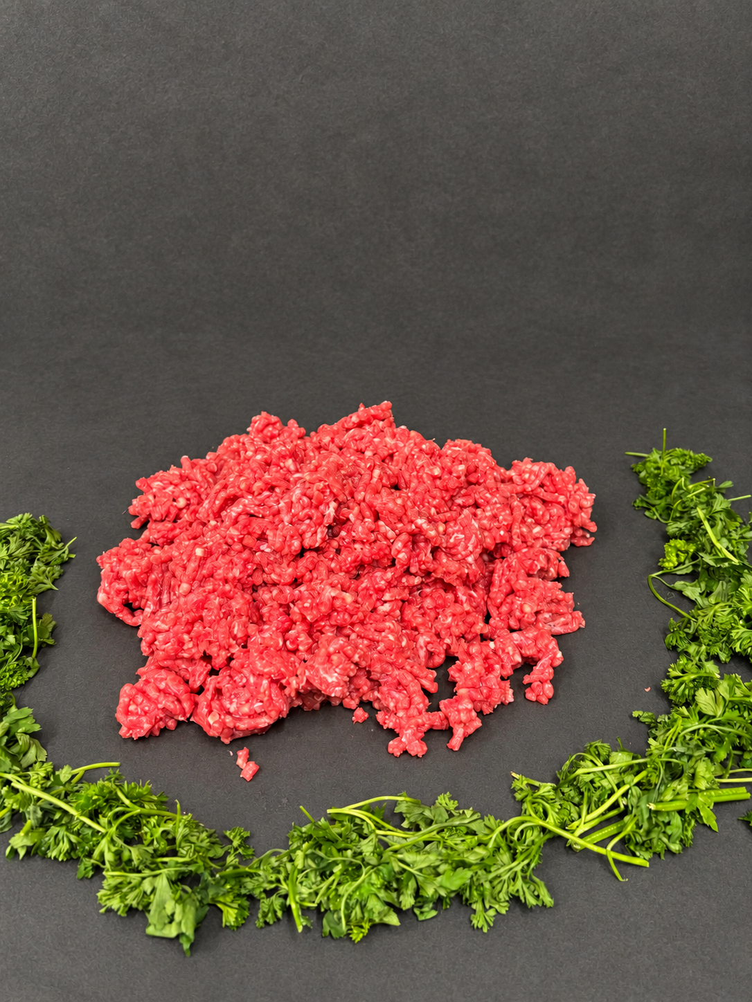 Minced Beef on a smooth charcoal background