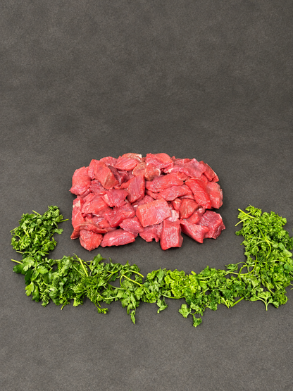 Diced Beef on a smooth charcoal background