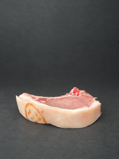 Pork Chops on a smooth charcoal background