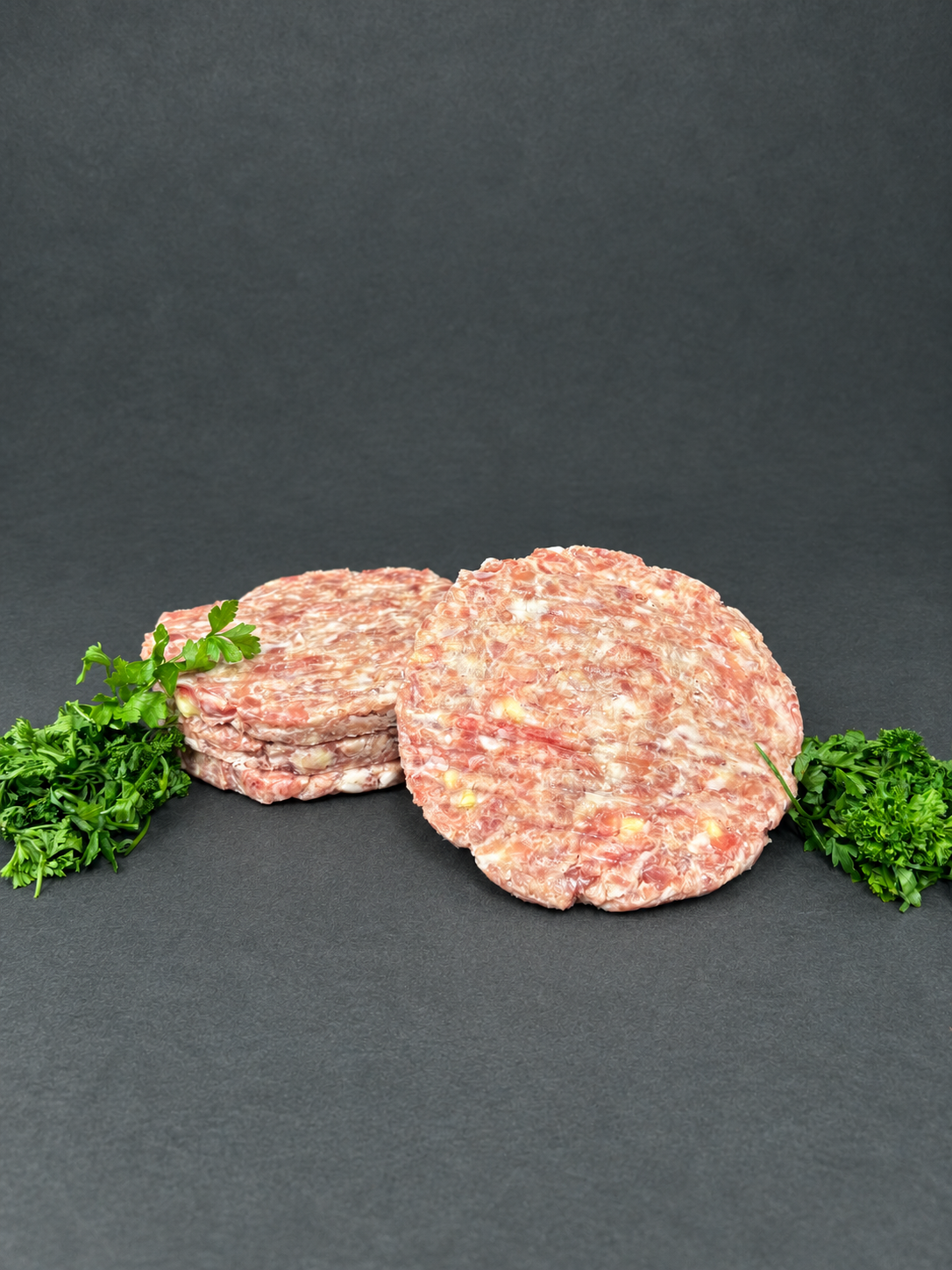 Burger 4-Packs on a smooth charcoal background