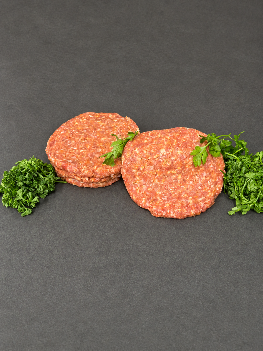 Burger 4-Packs on a smooth charcoal background