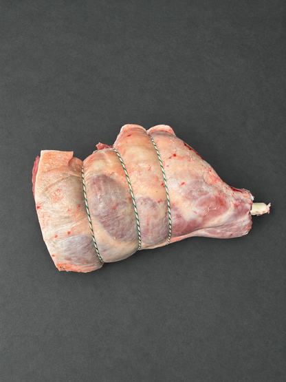 Leg Of Lamb on a smooth charcoal background