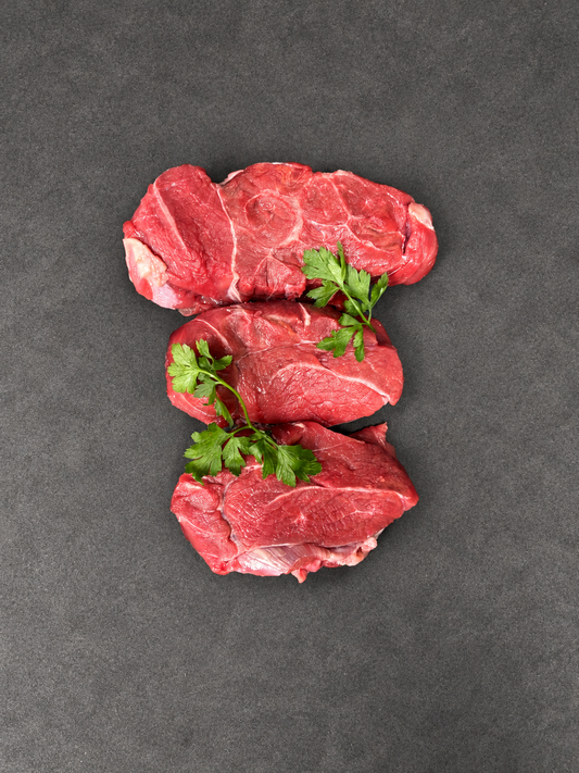 Shin Beef on a smooth charcoal background