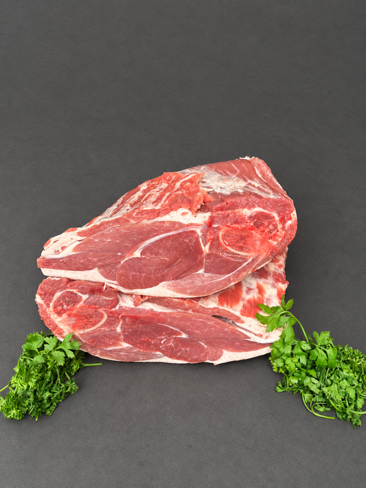 Shoulder Of Lamb on a smooth charcoal background