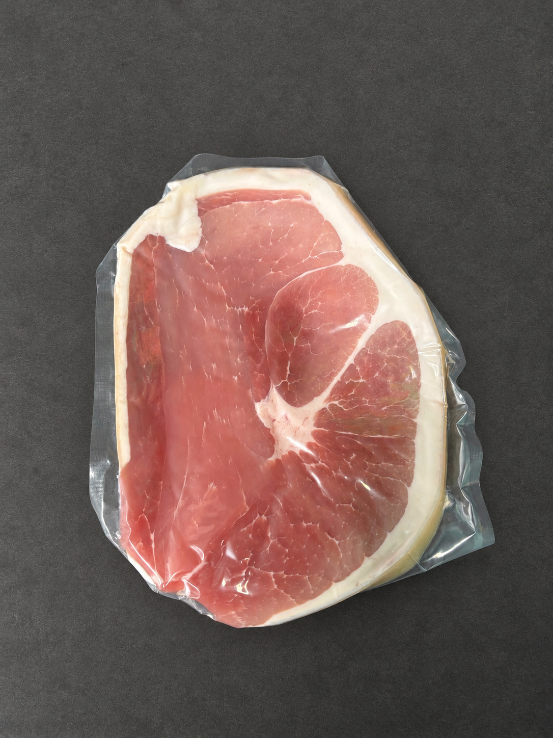 Gammon Steak on a smooth charcoal background
