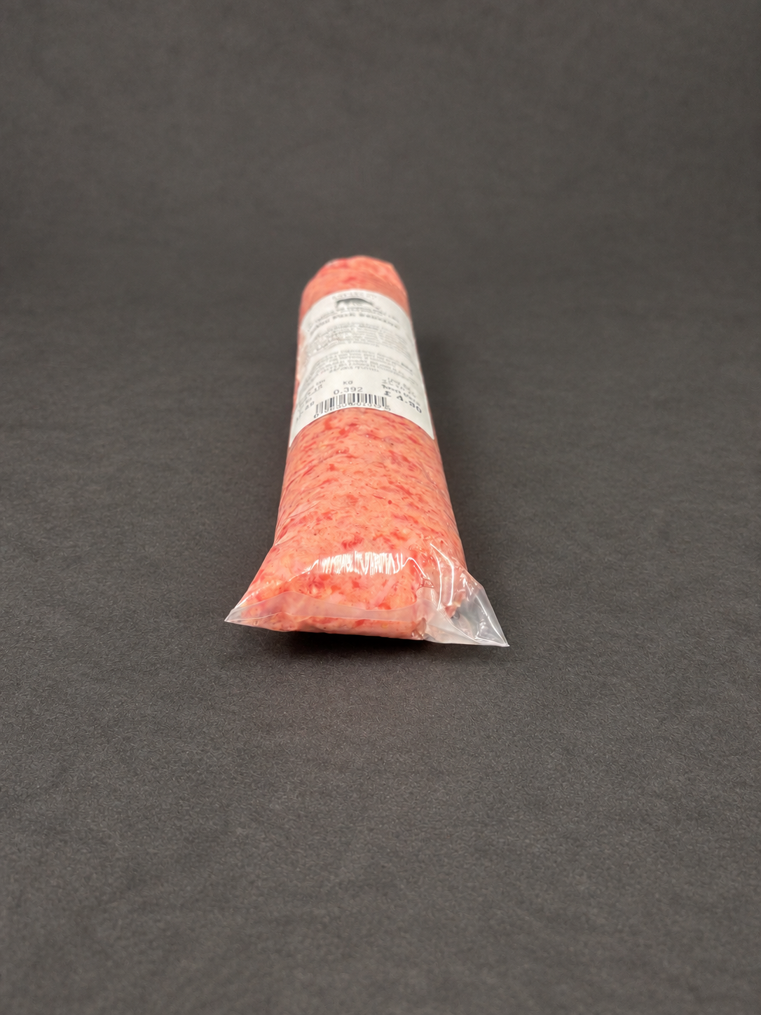 Sausage Meat on a smooth charcoal background