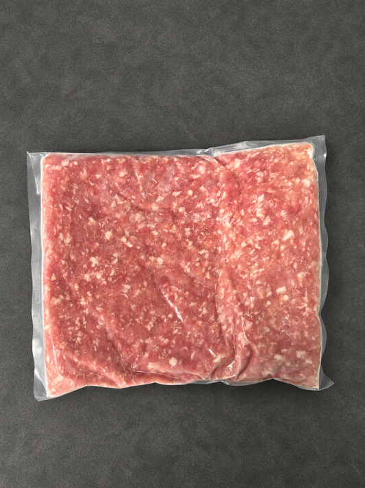 Minced Pork on a smooth charcoal background