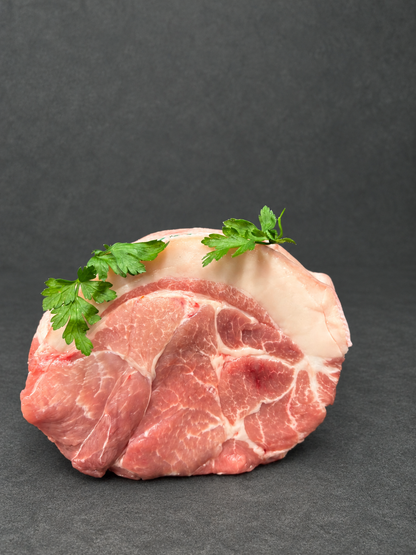 Shoulder Of Pork on a smooth charcoal background