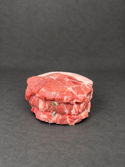 Shoulder Of Pork on a smooth charcoal background