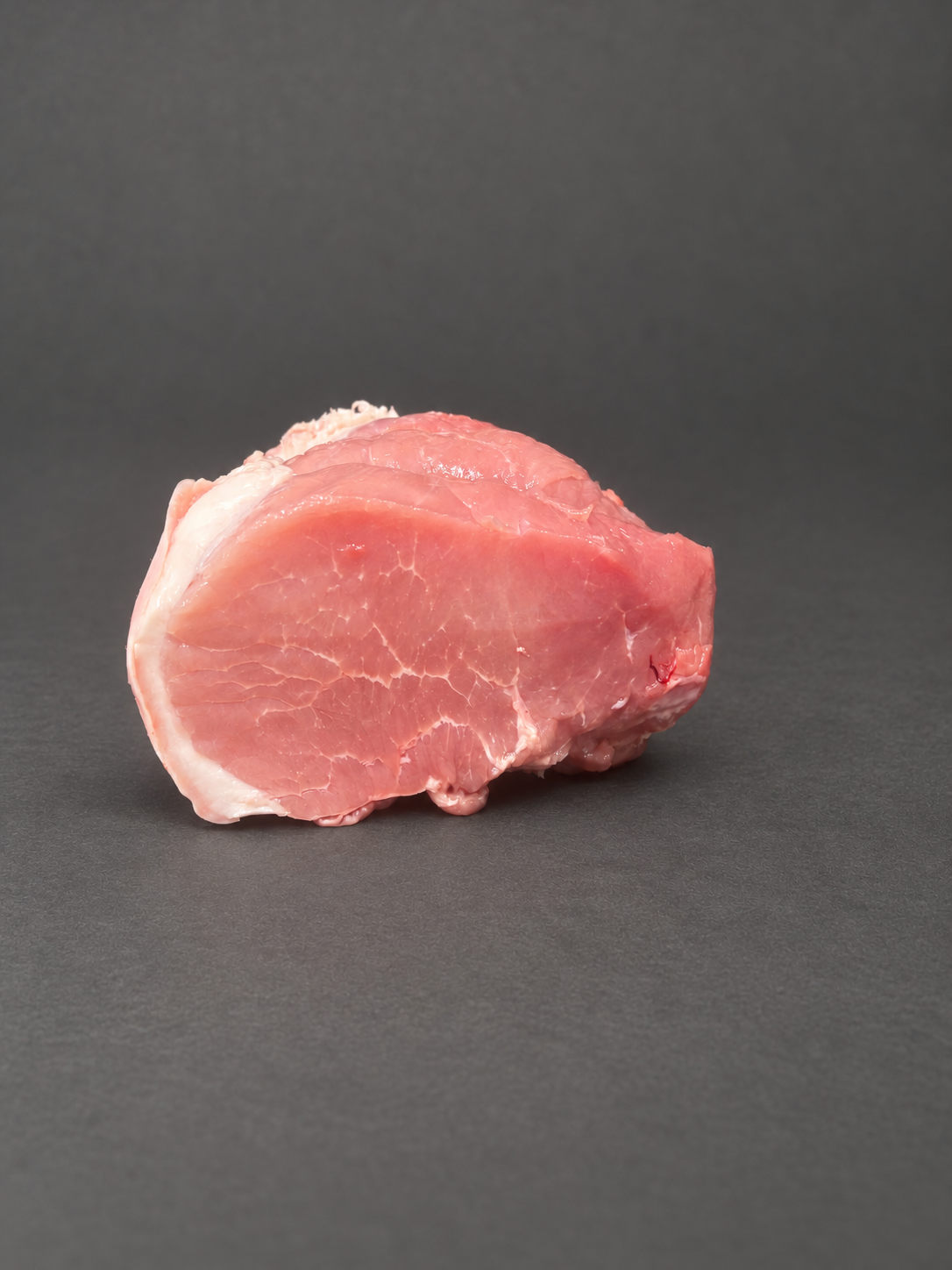 Pork Leg on a smooth charcoal background