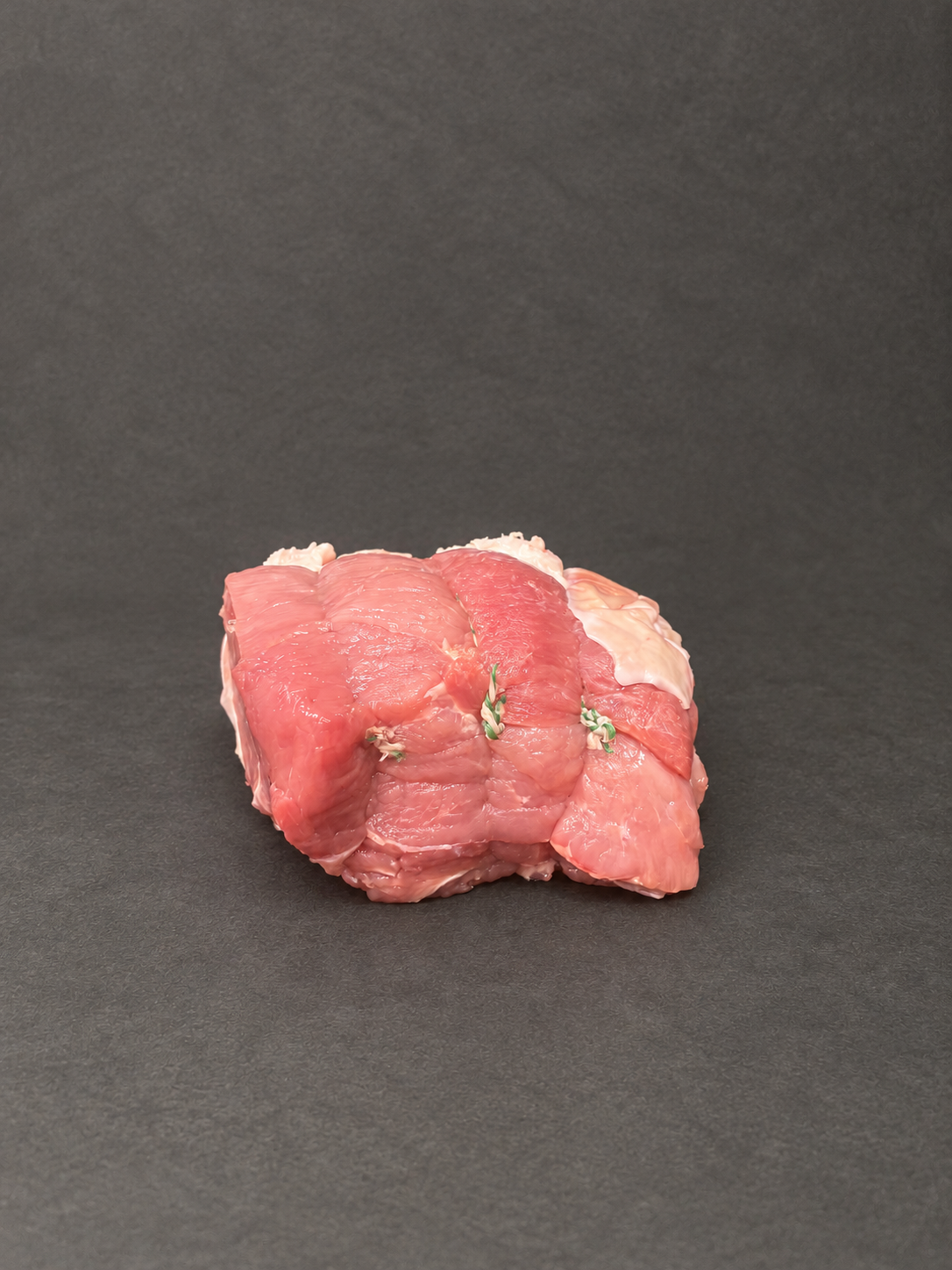 Pork Leg on a smooth charcoal background
